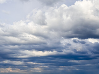 Scattered Cumulus Clouds above Deep Blue Sky