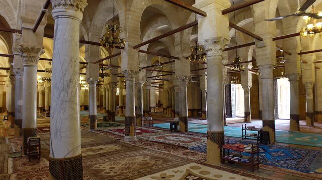 Walking through prayer rooms of historic Grand Mosque of Sfax, an important place of worship in Tunisia's second largest city