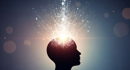 Silhouette of a head radiating bright light and cosmic energy symbolizing thought and inspiration