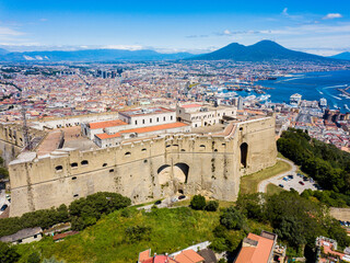 Naples, Italy - aerial view of the castle of San Telmo, the city and the volcano Vesuvius in the background