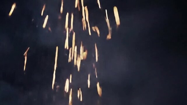 An abstract image of sparkling firework creates an energetic and enchanting atmosphere. Sparkling lights dance against the darkness, evoking wonder and celebration.