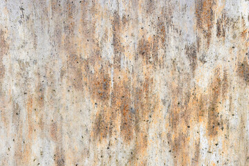 Fototapeta premium Rusted, weathered wall texture featuring orange-brown stains