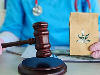Court session on medical cannabis with gavel and evidence bag in legal