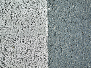A textured wall with a split design in gray shades and rich white tones for a striking effect