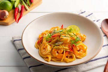 Creamy Spaghetti Tom Yum Kung,Thai style fusion food, spicy pasta with shrimp in tom yum sauce.