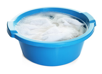 Plastic basin with towel and water isolated on white