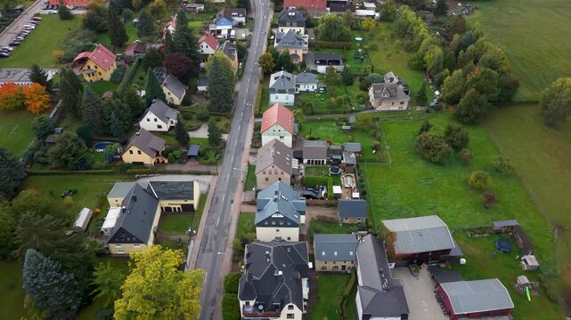 Aerial Freiberg Germany homes city traffic road. City center rural travel in eastern Germany. Historical buildings and landmarks. Urban historic center of East Germany. Total destruction in WW II.