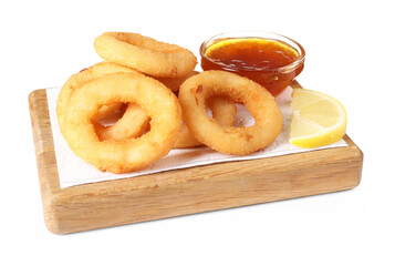 Tasty fried squid rings, lemon and sauce isolated on white