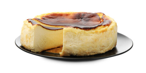 Cut freshly baked Basque cheesecake isolated on white