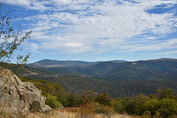 Mountain landscape forest stones rocks blue sky nature Balkans