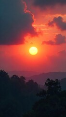 Obraz premium Dramatic Hazy Sunset Golden Light Through Thick Clouds Illuminates Picturesque Landscape