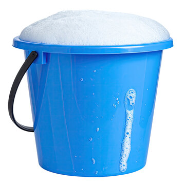 Blue plastic bucket overflowing with thick, white, soapy foam, with a black handle