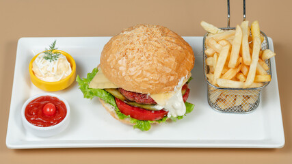 Burger and fries on tray