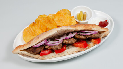 Doner kebab on plate top view isolated	