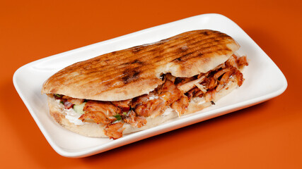 Doner kebab on plate top view isolated	