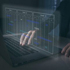 Businessman use calendar for appointments and organize agenda. Planning events on virtual screen.