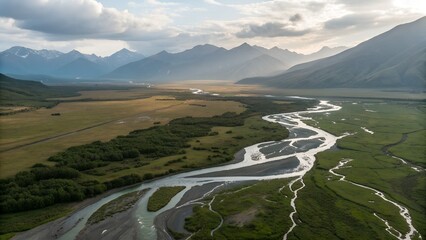 Aerial cinematic view of wide valley with braided river channels, mountains fading in the distance, ultra-realistic detail