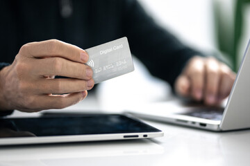 Man using credit card and paying via mobile banking app. Internet payment, online shopping, concept.