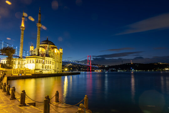 ORTAKOY, ISTANBUL, TURKEY. Ortakoy Mosque and Bosphorus Bridge sunrise view.