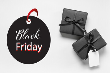 Black gift boxes on grey background