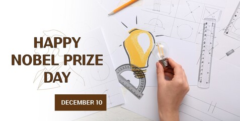 Hand with light bulb and drawings on light background. Nobel Prize Day