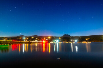Lake at dusk with mountains in the background in the valley of Bravo state of Mexico