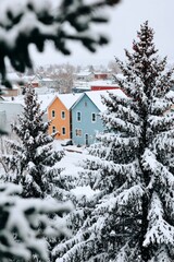 Snow blankets a quiet small town with cozy houses and frosted trees.