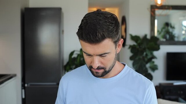 Handsome man doing random things at home 
