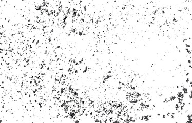 Abstract textured background with dark speckles and splatters on a white canvas