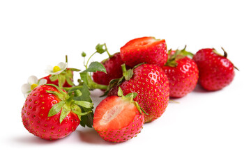 Sweet ripe strawberries with leaves and flowers on white background