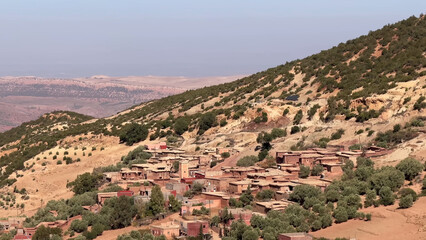A trip to Sahara desert in Morocco. Beautiful 
african travel photo. Sandy landscapes, roads, 
hills, and nature. Summer vacation in arab country.