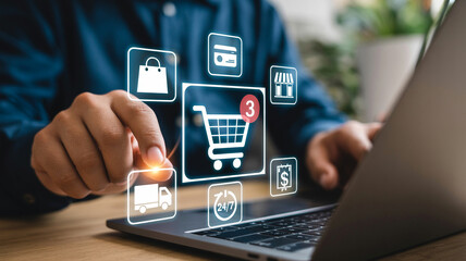 Person using a laptop with online shopping icons floating above the keyboard and hand reaching out