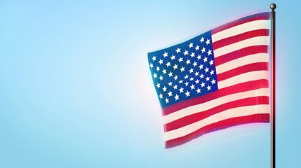 Fototapeta premium Patriotism concept. American flag waving in the wind against a clear blue sky background, symbolizing patriotism and national pride