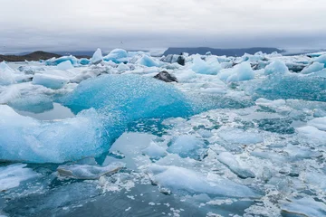 Fotobehang Gletsjer Ice floes on glacier lagoon Jokulsarlon in Iceland  © Alexander Erdbeer