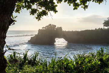 View of a cliff where there is a temple at sunset