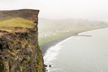 View onto the town Vik in Iceland from a mountain