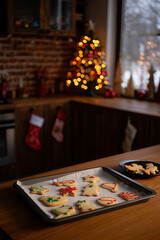 Christmas Cookies on Tray in Cozy Holiday Kitchen with Tree and Stockings