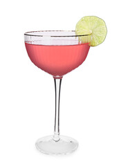 Glass of tasty Cosmopolitan cocktail garnished with lime slice on white background
