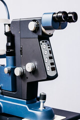 Ophthalmic equipment featuring advanced laser vision correction technology, showcasing intricate controls and precision optics for comprehensive vision examination and patient care