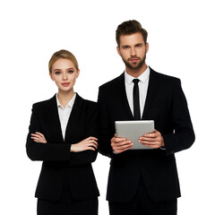 Two business professionals posing confidently in formal attire with a tablet in a studio setting, showcasing a modern and professional atmosphere