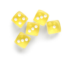 Many yellow game dices on white background