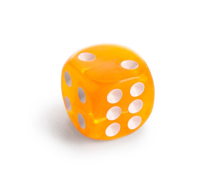 Orange game dice on white background