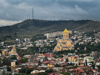 Fototapeta premium Panoramic cityscape view of the Tbilisi architecture from the top of the cathedral