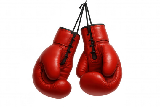 Red boxing gloves hanging with laces tied together, symbolizing sport, fight, competition, and victory