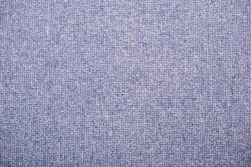 Fabric surface with woven blue pattern