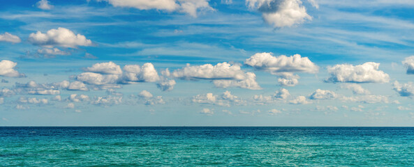 Sea sunrise on ocean beach. Sunset seascape at summer vacation. Horizon with sea cloudy sky. Calm...