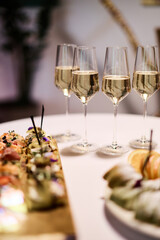 Elegant Wine Glasses with Wine on a Table	