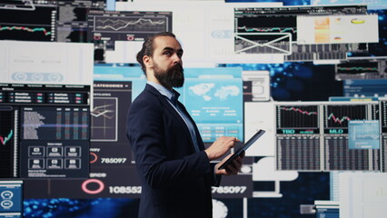 Fototapeta premium Company administrator searching for a new solution to obtain business growth, working hard for success while he analyzes all reports and KPI metrics. International expansion. Camera B.