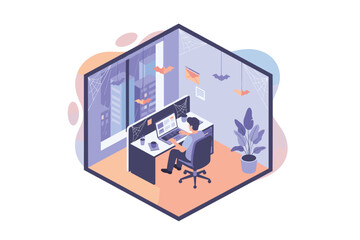 Man working on laptop in a Halloweendecorated office blending productivity with festive spirit