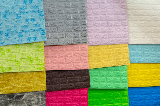 Self-adhesive 3D wall panel on the showcase of a hardware store